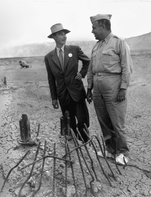 General Leslie Groves and J. Robert Oppenheimer at the Trinity test site zero point